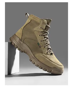 Detailed view of durable tan suede outdoor boots with high-top design and thick rubber sole.