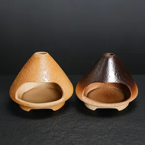 Handcrafted ceramic aromatherapy burner for palo santo and sage bundles with fireplace design