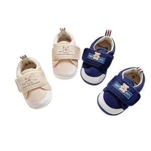 Cute cartoon baby walking shoes with soft non-slip soles and velcro straps for toddlers