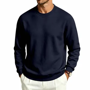 Detail view of a men's navy blue crewneck heavy fleece sweatshirt in a loose casual fit.