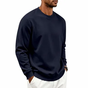 Close-up detail of a men's navy blue crewneck sweatshirt with a comfortable loose fit
