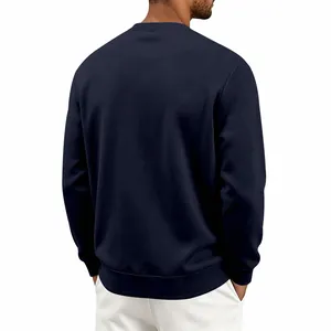 Back view of a classic navy blue men's crewneck sweatshirt with ribbed cuffs and hem