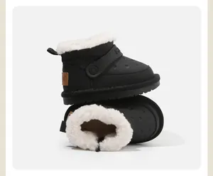 Detailed view of children's black snow boots with warm white fleece lining.