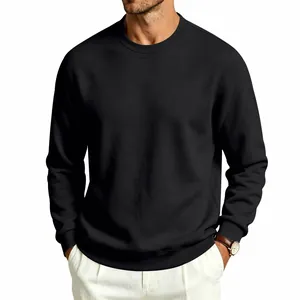 Detailed view of a men's classic black heavyweight fleece-lined crewneck sweatshirt