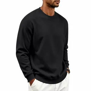 Side view detail of a classic black crewneck sweatshirt for men with a relaxed fit