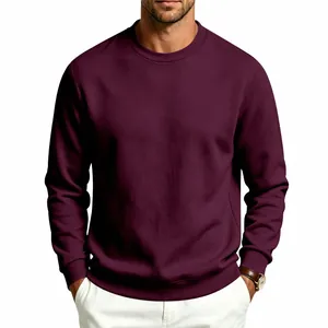 Detail of a men's burgundy crew neck sweatshirt showing the relaxed fit and rich color.