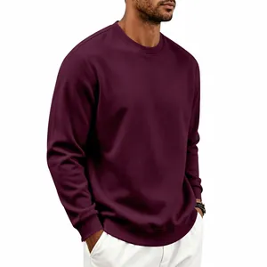 Detailed view of men's heavy fleece crewneck sweatshirt in burgundy red color