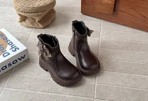 Dark brown girls Martin boots with houndstooth bow detail and side zipper