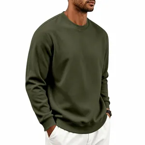 Detailed view of heavy olive green crewneck sweatshirt showing fabric and loose fit
