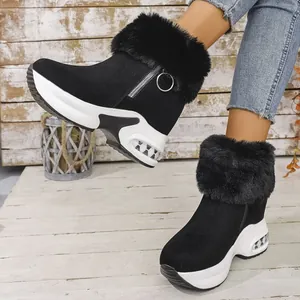 Botas de nieve negras para mujer con ribete de piel sintética y suelas de plataforma