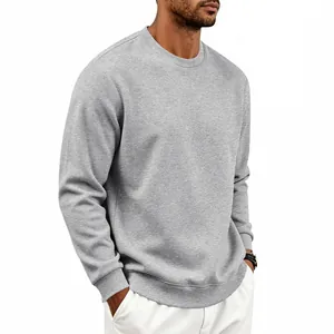 Close-up detail of men's heavyweight fleece sweatshirt in classic grey crewneck style