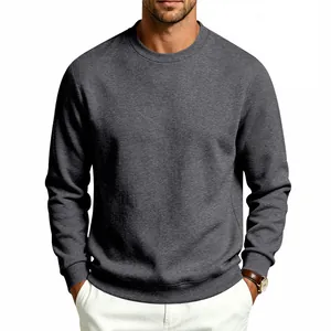 Front view detail of a classic dark grey crew-neck sweatshirt in relaxed fit.