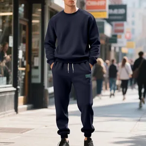 Premium men's navy blue heavy fleece sweatshirt and sweatpants tracksuit set on street