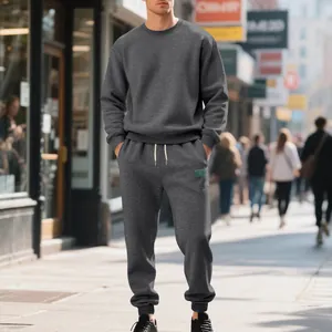 Detailed view of a dark gray heavy fleece crewneck sweatshirt and sweatpants set