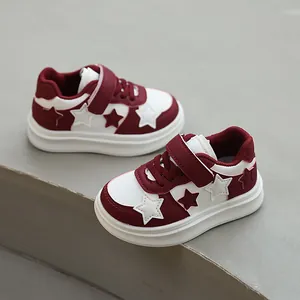 Trendy red and white children's star pattern sneakers with velcro straps for boys and girls