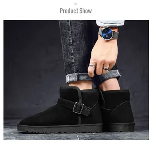 Close-up view of premium black suede winter snow boots with a side metal buckle