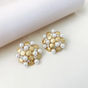 Vintage golden sunflower stud earrings with elegant faux pearls and clear rhinestones