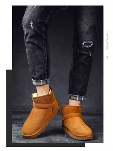 Detail of warm suede leather snow boots with thick faux fur lining for winter.