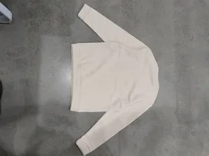 Rear view of a classic cream heavy fleece crewneck sweatshirt for men in a relaxed fit