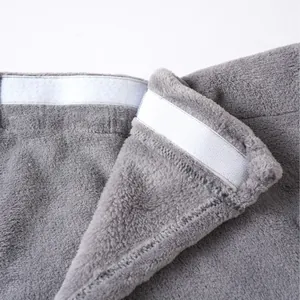 Premium grey plush wearable bathrobe for men featuring adjustable white magic tape closure