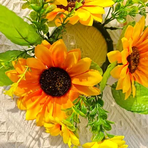 Bright artificial sunflower wreath and candle ring decoration for home and photography props