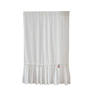 White cotton fabric door curtain featuring yellow polka dots and elegant ruffled cherry detail