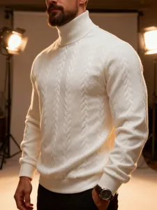Close-up of men's white turtleneck cable knit sweater in professional studio lighting.
