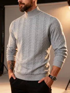 Detailed view of men's gray cable knit turtleneck sweater showing thick warm texture