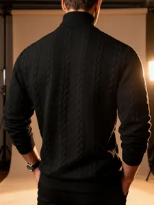 Detailed back view of a men's black cable-knit turtleneck sweater with warm texture