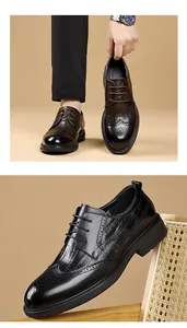 Close-up of men's business dress shoes featuring crocodile pattern and brogue style
