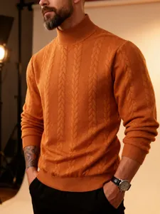 Close-up detail of a men's orange cable-knit turtleneck sweater with warm texture