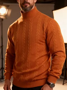Close-up of men's orange cable-knit turtleneck sweater showing thick and warm texture detail