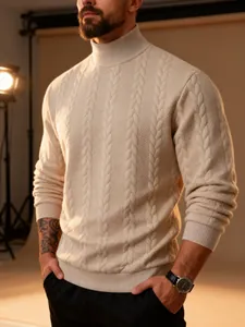 Close-up of beige men's turtleneck sweater showing intricate cable-knit patterns and thick texture