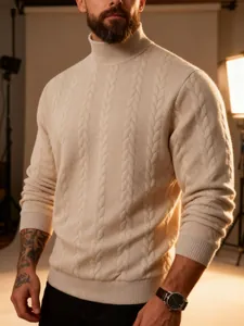 Detail shot of men's cream cable-knit turtleneck sweater with thick warm texture