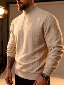 Detail view of men's beige cable-knit turtleneck sweater with thick wool texture.