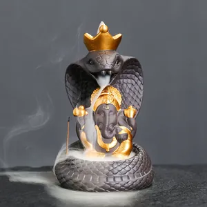 Ganesha backflow incense burner with crowned cobra snake design in purple sand ceramic