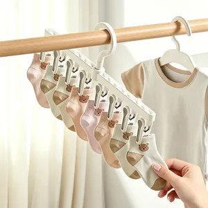Langlebiger weißer Baby-Wäschebügel mit Clips zum Trocknen von Socken und Kleinkindwäsche