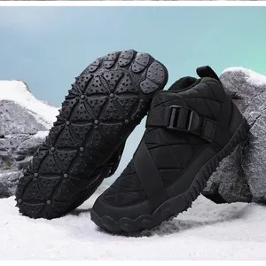 Detailed macro shot of black five-finger snow shoes with anti-slip thick rubber sole