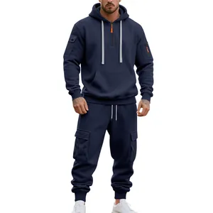 Detailed view of navy blue cargo hoodie and sweatpants set with orange zipper accents.