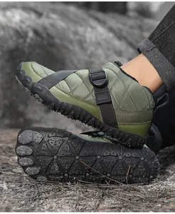 Macro view of five-finger outdoor winter shoe showing non-slip sole and quilted fabric