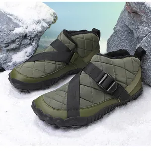 Waterproof outdoor snow boots with warm fleece lining and non-slip sole in snow scene