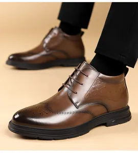 Detailed side view of classic brown leather brogue boots with non-slip black soles