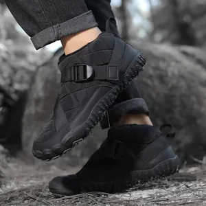 Black waterproof outdoor winter boots with warm fleece lining and anti-slip spiked rubber sole
