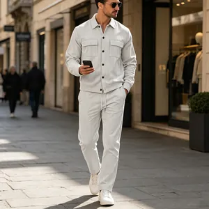 Men's light gray corduroy set featuring multi-pocket workwear jacket and matching trousers
