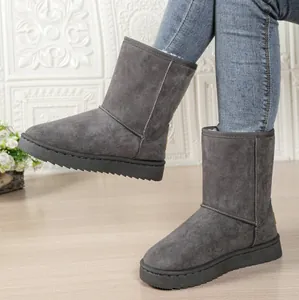 Detailed side view of grey mid-calf snow boots with thick soles and warm fur lining