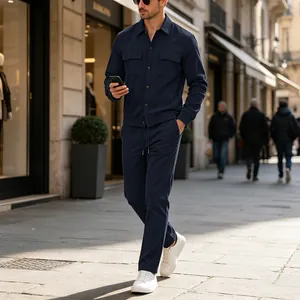 Men's navy corduroy casual set with jacket and trousers shown in a stylish street view