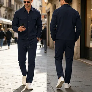 Front and back detail views of navy blue corduroy workwear jacket and trousers set for men