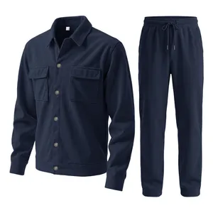 Detailed view of men's navy blue corduroy jacket and trousers two-piece set