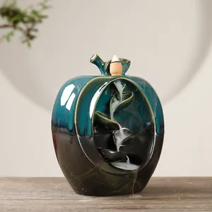 Creative apple-shaped ceramic backflow incense burner with elegant teal and brown glaze