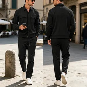 Detail view of men's black corduroy casual set with multi-pocket shirt and matching pants